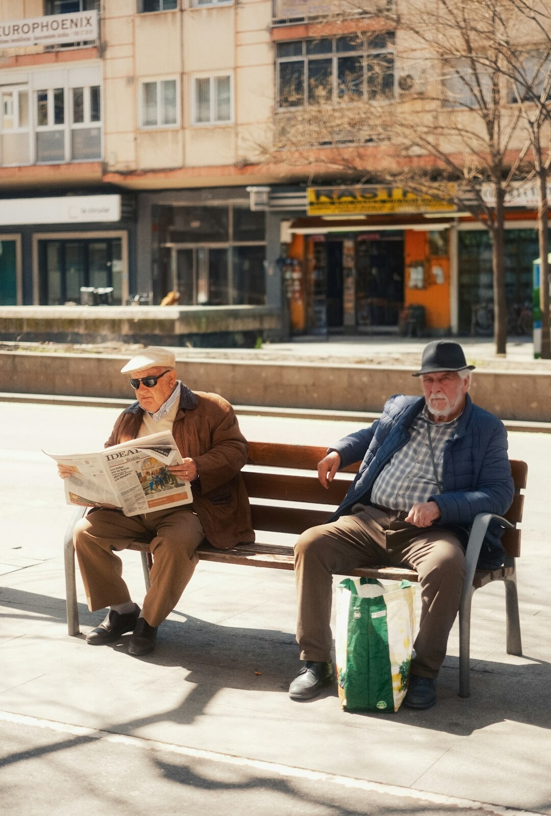 elderly person reading book