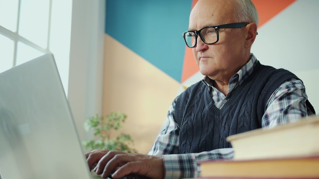 elderly man reviewing pension documents